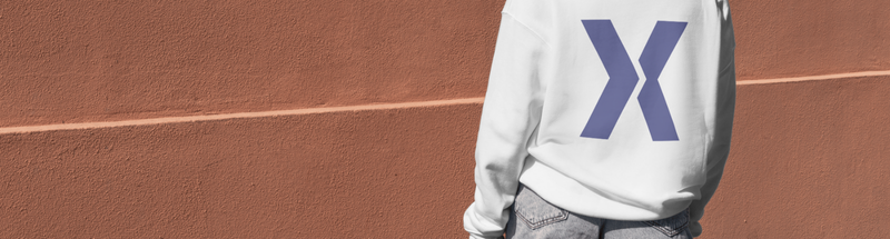 woman wearing staXscale branded sweatshirt