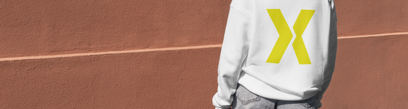 woman wearing a staXscale sweatshirt