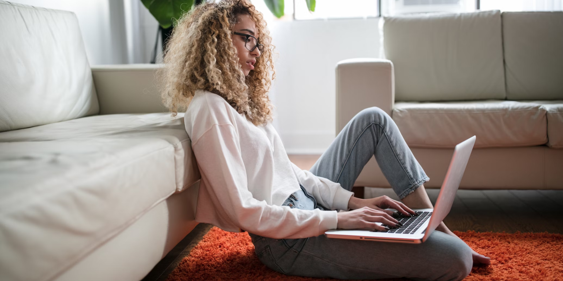 scaling before you "make it" - woman working on laptop