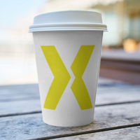 staXscale logo on paper coffee cup